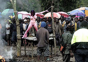 Public torture of white witch in the modern Africa
